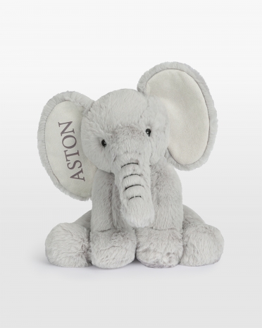 Norsu pehmolelu ruskealla brodeeratulla nimellä