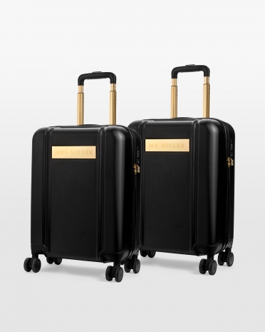 2 kpl mustia käsimatkalaukkuja häämatkalle