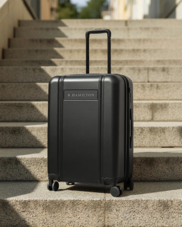 Henkilökohtaisesti kaiverrettu tummanharmaa matkalaukku