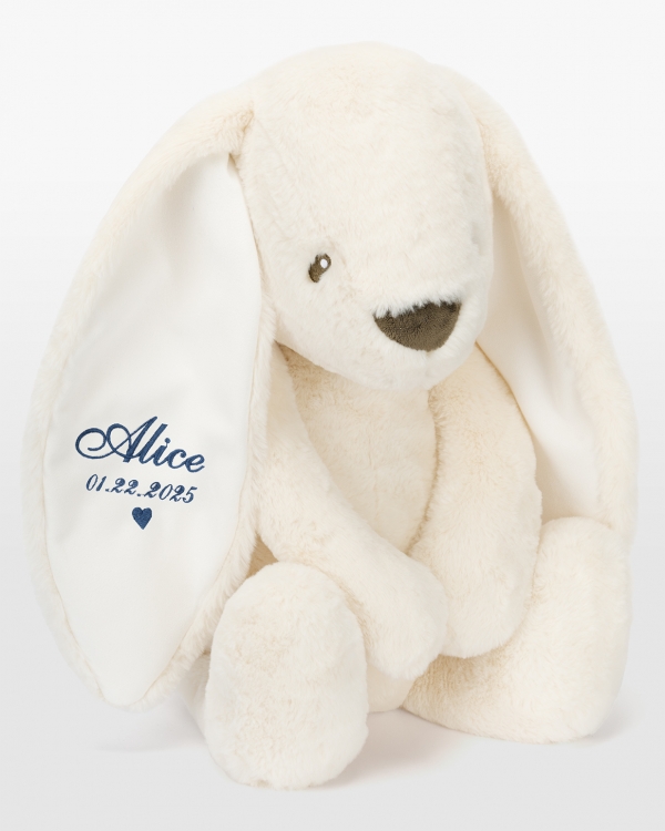 Jättikani nimellä sinisellä brodeerauksella