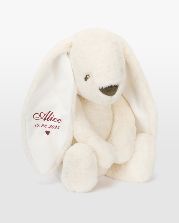 Jättikani nimellä tummanpunaisella brodeerauksella