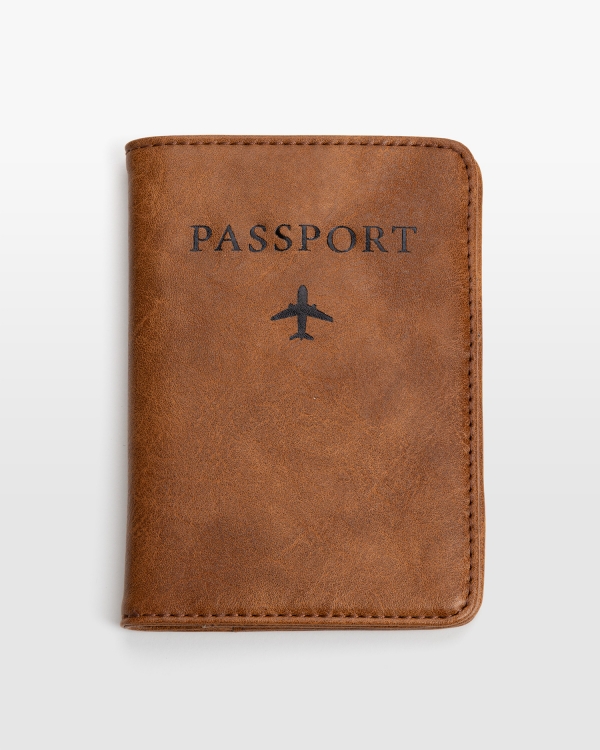 Passikotelo konjakinvärisestä vegaaninahasta painatuksella