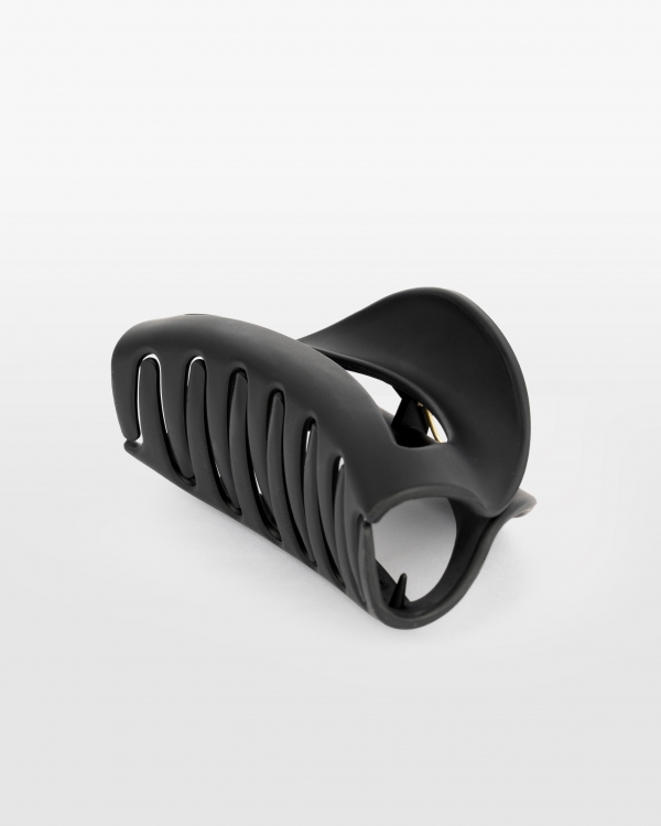 Musta hiuspinni hyvässä kunnossa