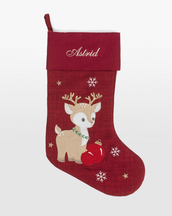 punainen joulusukka joulupukin porolla ja henkilökohtaisella brodeerauksella