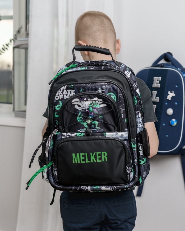 Koulureppu dinosauruksella