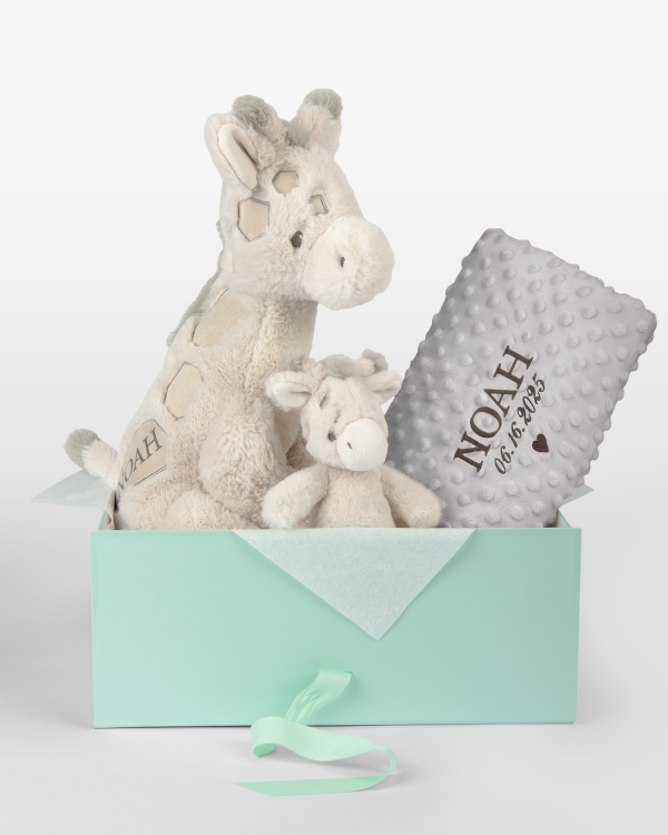 Lahjasetti lapsille, jossa helistin, pehmolelu ja pehmeä harmaa viltti nimellä