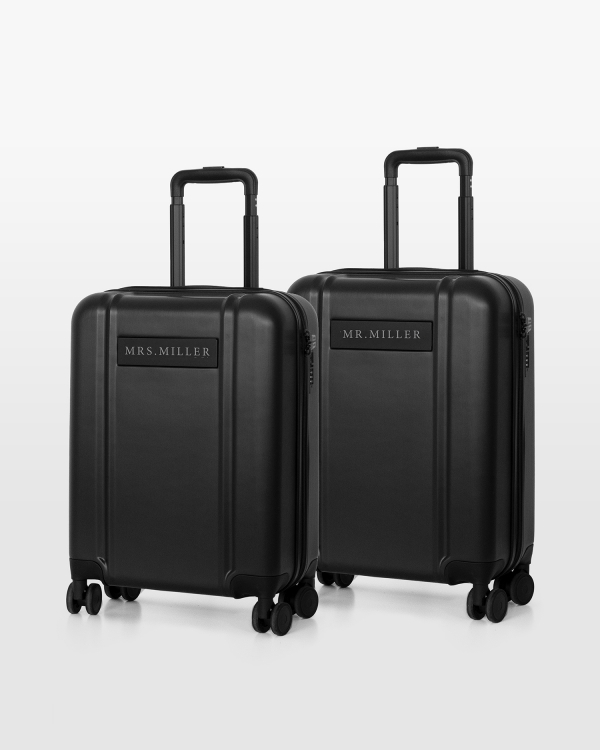 2 kpl mustia käsimatkalaukkuja häämatkalle