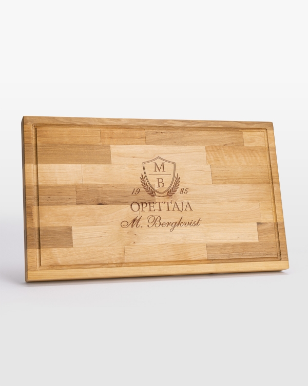 Leikkuulauta henkilökohtaisella tekstillä opettajalle