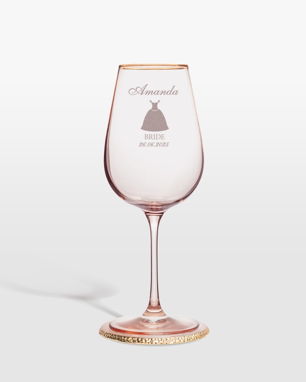 Vaaleanpunainen viinilasi henkilökohtaisella kaiverruksella kaasolle