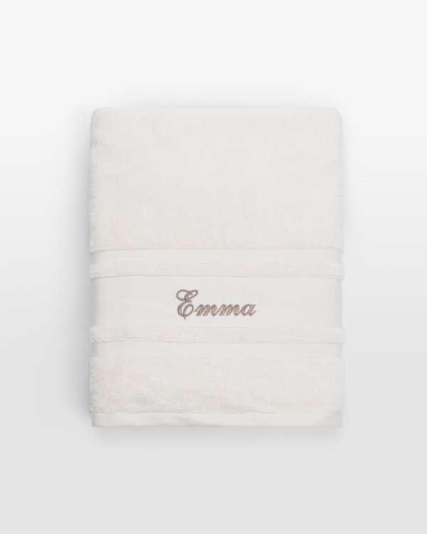 Kermanvärinen pyyhe nimellä