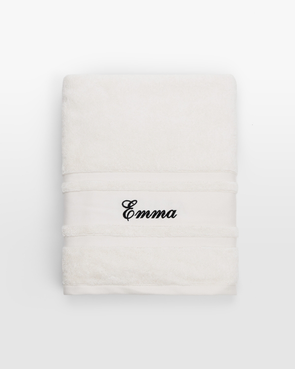 Kermanvärinen pyyhe nimellä