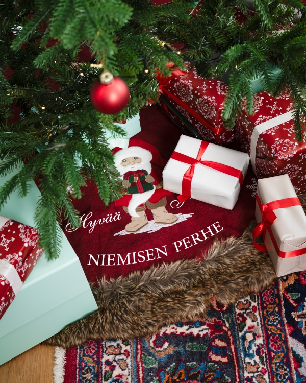 punainen joulukuusen alusta painatuksella