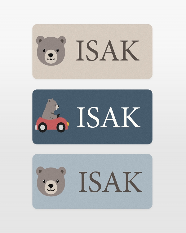 Namnlappar och klistermärken med björnmotiv och en textrad
