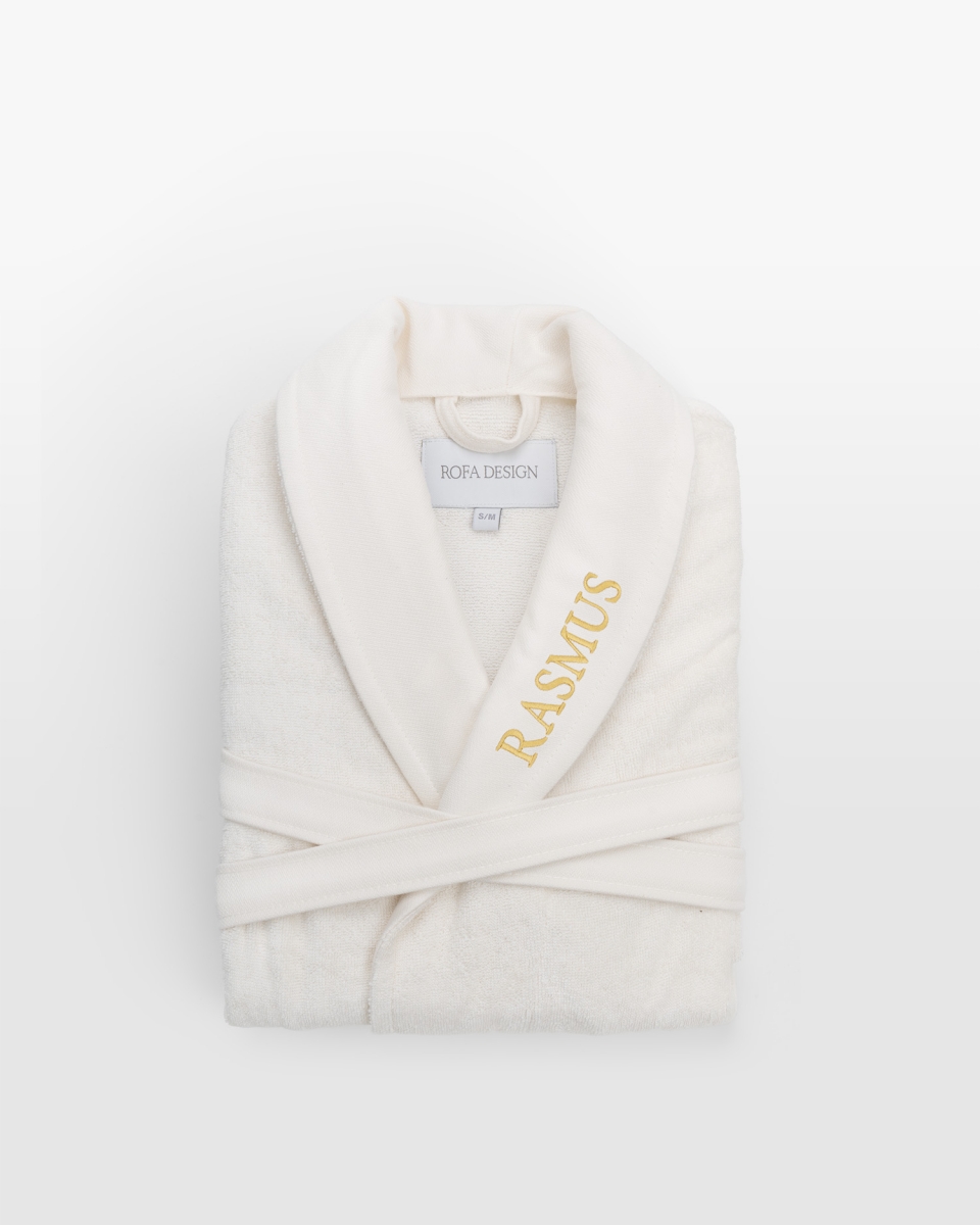 Lasten kylpytakki nimellä, kerma (Koko: 134/140, Kirjailuväri: Musta)